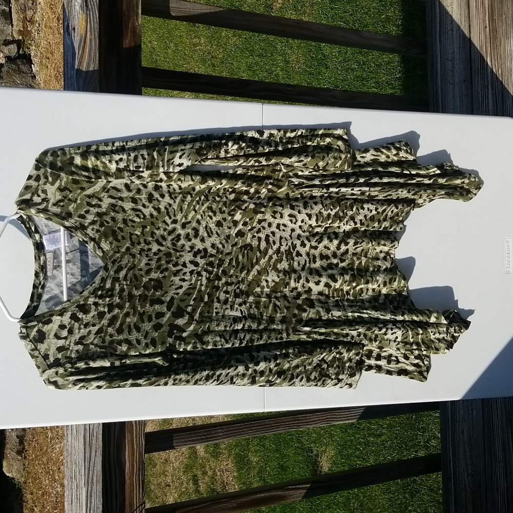LOGO top by Lori Goldstein